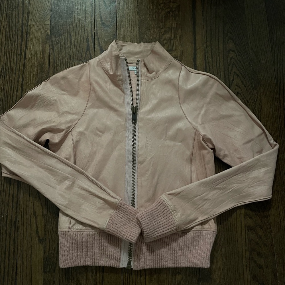 Blush colored faux leather jacket. Can be dressed up or down. Great for spring.